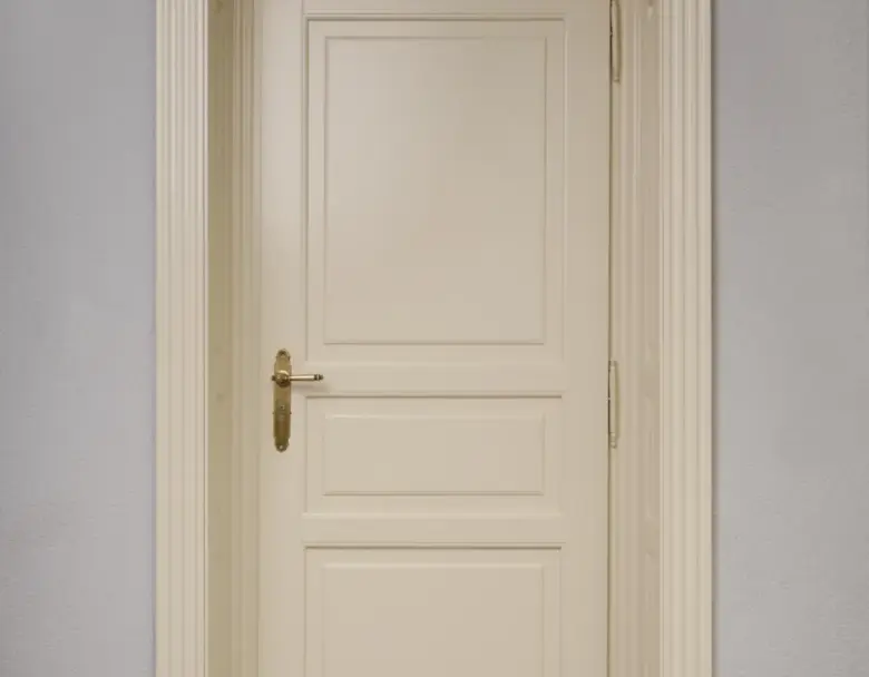 White interior door with a moulded casing
